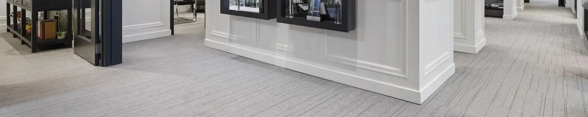 Office with grey commercial carpet flooring
